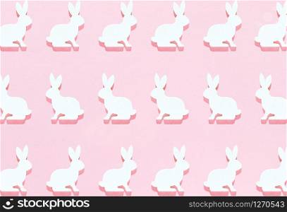 Easter white bunny flat lay pattern on bright pink background with hard shadows, wallpaper, greeting card, top view