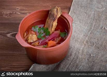 Eastern European beet soup with pork belly