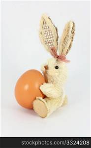 Eastern rabbit made of straw and chicken egg