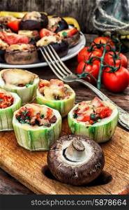 Easy appetizer of mushrooms stuffed with cheese,garlic and tomatoes