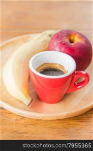 Easy meal with red apple, banana and coffee, stock photo
