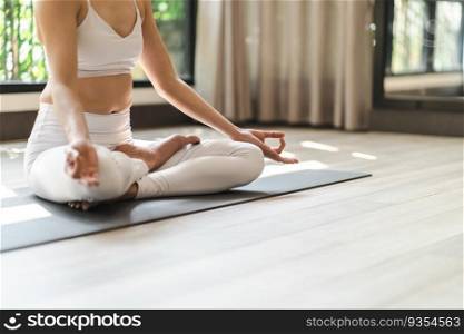 Easy Seat pose Female Attractive asian woman doing yoga stretching exercise on mat yoga   fitness exercises. Healthy lifestyle Calmness and relax at home