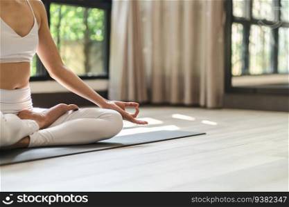 Easy Seat pose Female Attractive asian woman doing yoga stretching exercise on mat yoga & fitness exercises. Healthy lifestyle Calmness and relax at home