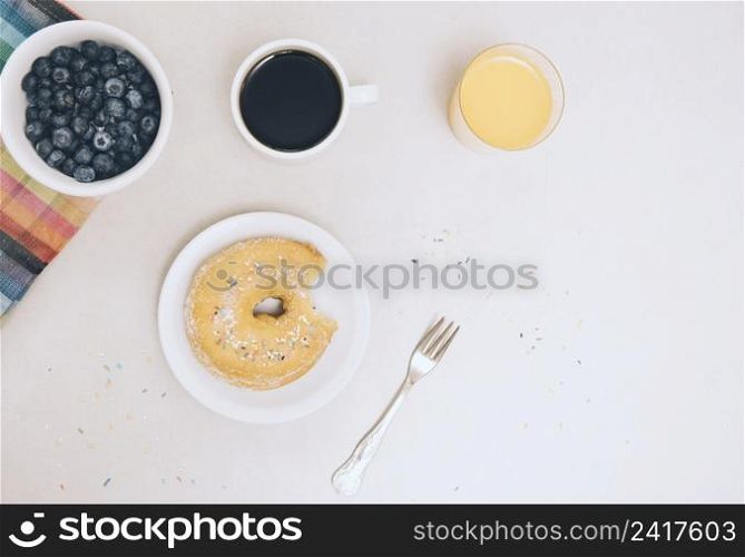 eaten donut coffee juice blueberries isolated white background
