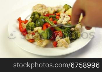 Eating Chicken and Vegetable Stir Fry