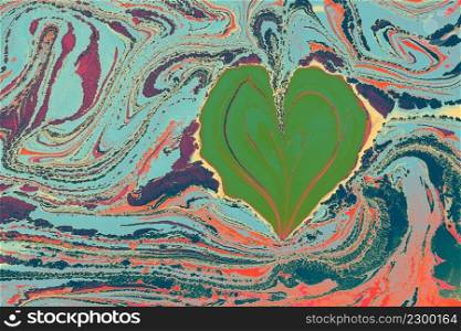 Ebru  marbling  background with heart shape.