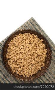Eco food soy mince in a wooden bowl. Studio photo. Eco food soy mince in a wooden bowl