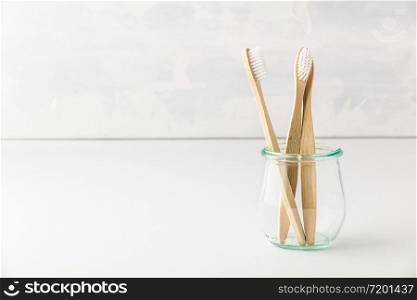 eco-friendly bamboo toothbrushes in a glass jar. Zero waste, Recycling, Sustainable lifestyle concept