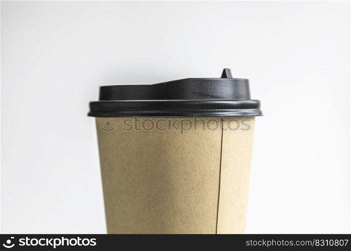 Eco friendly brown cup,Takeaway paper coffee cup isolated on white background. Zero waste and ecology concept. eco-friendly disposable brown paper cup mock up design close up. Eco friendly brown cup,Takeaway paper coffee cup isolated on white background. Zero waste and ecology concept. eco-friendly disposable brown paper cup mock up design