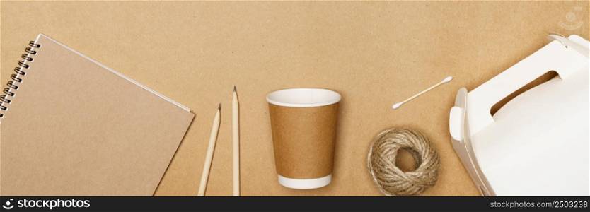 Eco friendly concept, Delivery food container and paper cup with jute rope and notebook with pencil.