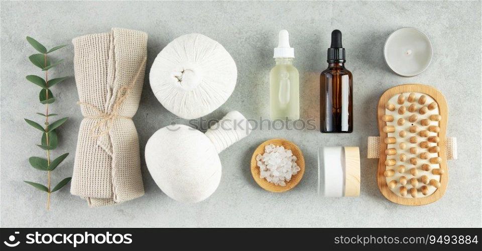 Eco friendly lifestyle concept. Top view photo of Spa set with massage herbal balls on grey background top view copy space