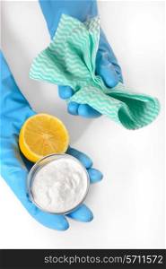 Eco-friendly natural cleaners baking soda, lemon and cleaning cloths