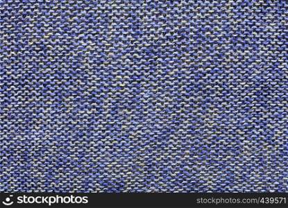 Eco-friendly natural fabric and background from flax with blue-white color close-up. Background and texture of knitted fabric weaving from environmentally friendly linen