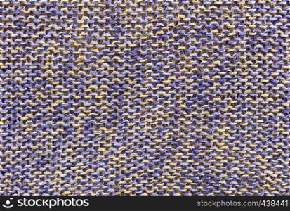 Eco-friendly natural fabric and linen background with blue-beige color close-up. Background and texture of weaving knitted fabric from environmentally friendly flax blue-beige color