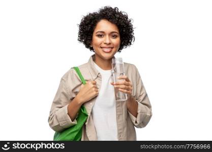 eco living, zero waste and sustainability people concept - happy smiling woman with water in reusable glass bottle and shopping bag over grey background. happy woman with water in glass bottle and shopper