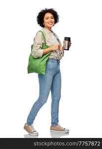 eco living, zero waste and sustainability people concept - happy smiling woman with thermo cup and shopping bag over white background. happy woman with thermo cup and shopping bag