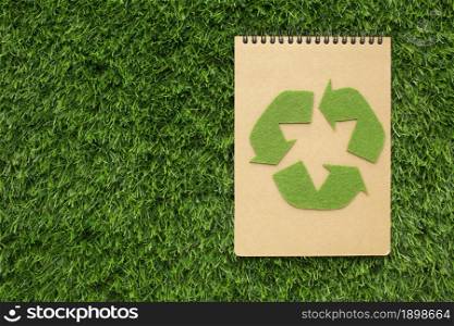 ecological notebook with recycle sign. Resolution and high quality beautiful photo. ecological notebook with recycle sign. High quality beautiful photo concept