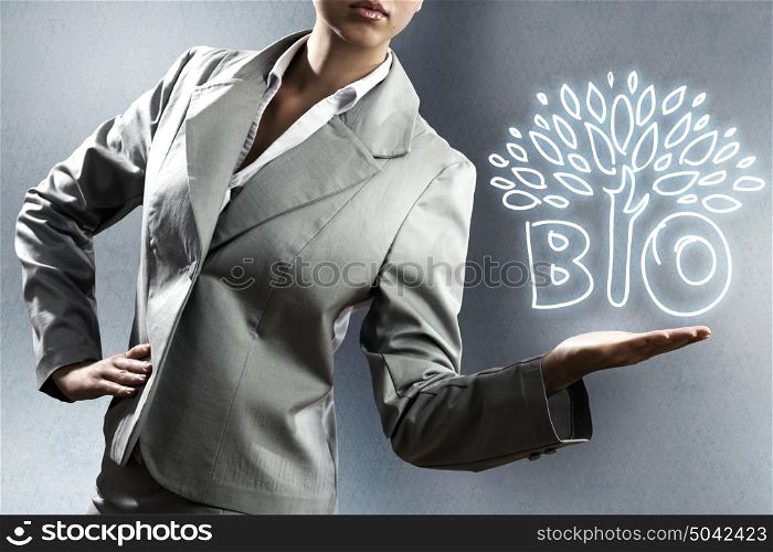 Ecology concept. Close up of businesswoman holding tree sketch in palm
