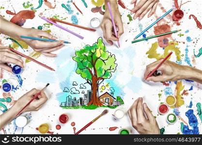 Ecology green concept. Top view of hands drawing eco green life concept