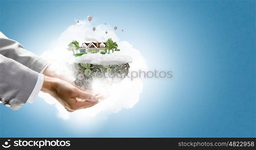 Ecology life concept. Female hands holding green life concept in palm