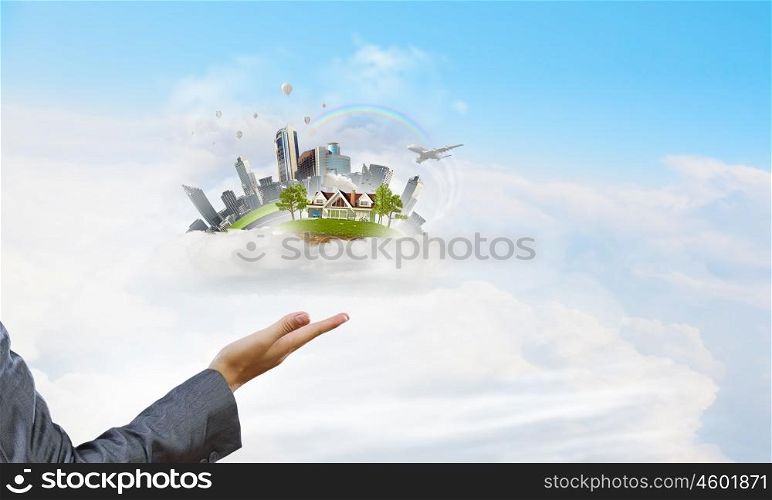 Ecology life concept. Male hands holding green life concept in palm