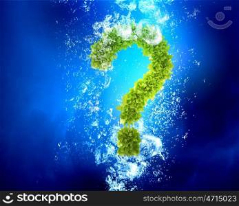 Ecology question mark. Green question mark in clear blue water