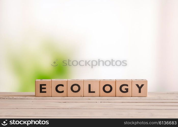 Ecology sign on a wooden desk in the nature