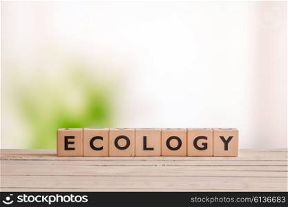 Ecology sign on a wooden desk in the nature