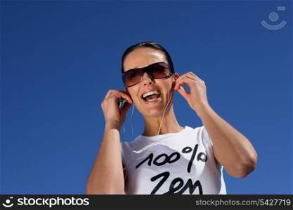 Ecstatic woman listening to her mp3 player