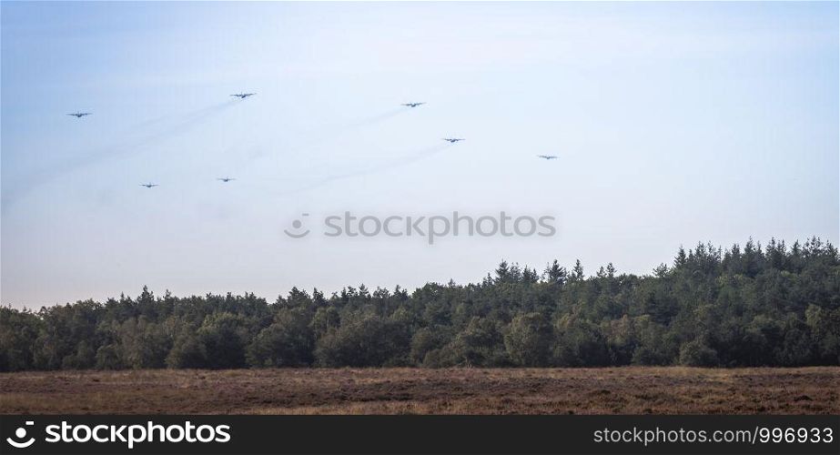 Ede,20-sep-2019:the dakota and hercules planes are approaching the heathland for dropping the paratroopers on the occasion of operation airborn, commemoration of market garden