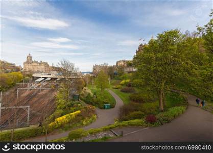 Edinburgh, Scotland Skyline with Princess Street Gardens, Waverly Train Station in sight on a beautiful spring afternoon