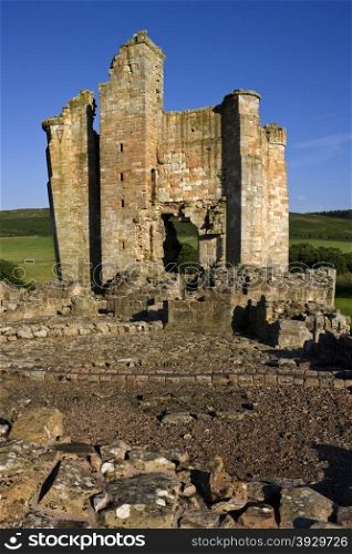 Edlingham Castle near Alnwick in Northumberland in North East England. The ruins of a manor house thought to have been built by William de Felton in 1295AD. It was fortified against the Scots during the 14th Century.