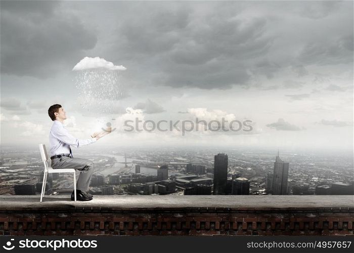 Education advantage. Businessman sitting in chair and reading book