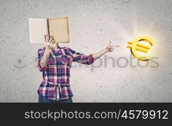 Education advantage. Young woman reading book and pointing at euro sign