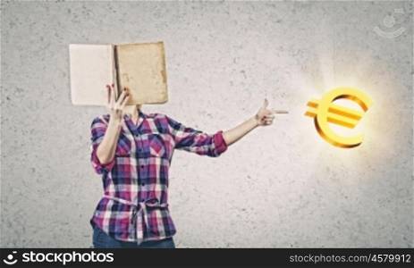 Education advantage. Young woman reading book and pointing at euro sign