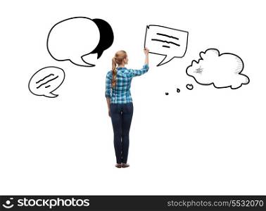 education and advertising concept - young woman from the back drawing text bubbles in the air
