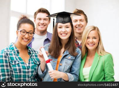 education and competition concept - girl in graduation cap with certificate and students