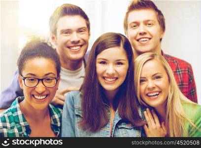 education and friendship concept - group of students at school. group of students at school