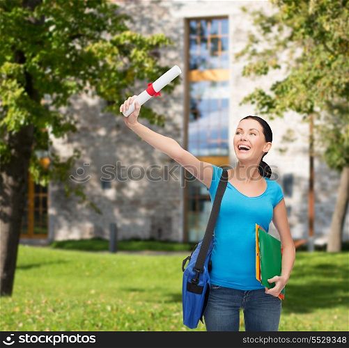 education and happy people concept - smiling student with bag, folders and diploma