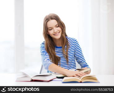 education and home concept - happy smiling student girl with books