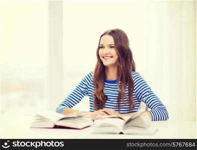 education and home concept - happy smiling student girl with books