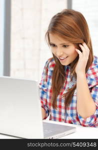 education and internet concept - smiling student girl with laptop at school