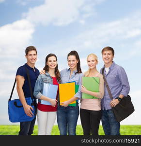 education and people concept - group of smiling students standing