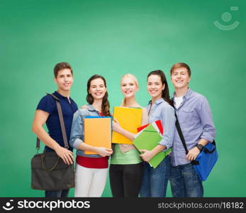 education and people concept - group of smiling students standing