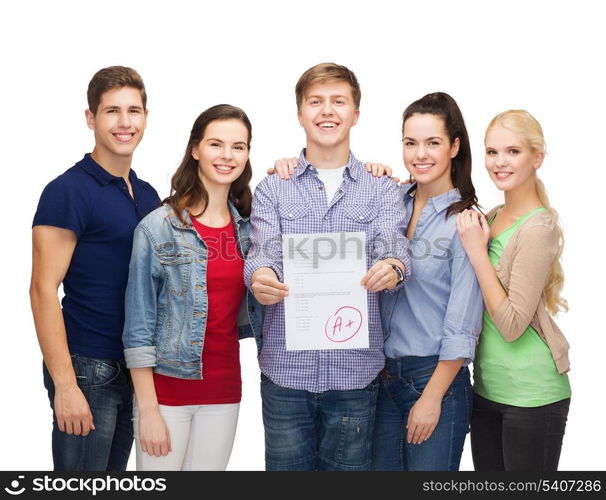 education and people concept - group of smiling students standing and showing test result