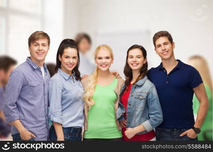 education and people concept - group of standing smiling students