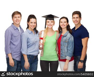 education and people concept - group of standing smiling students with diploma and corner-cap