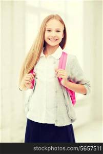 education and school concept - happy and smiling teenage girl with school bag