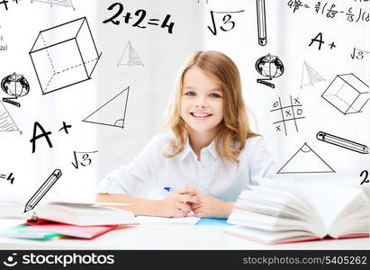 education and school concept - little student girl studying at school