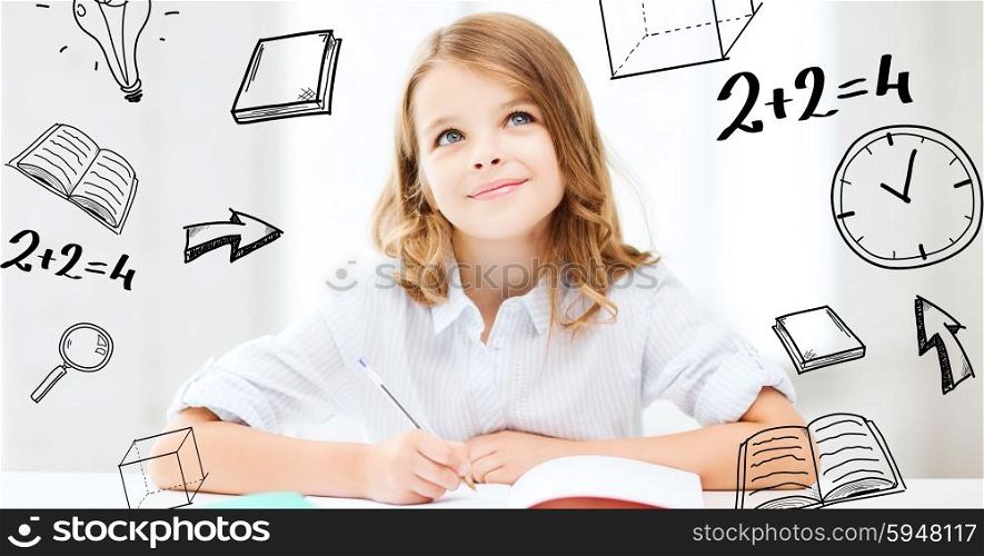 education and school concept - little student girl studying at school. student girl studying at school